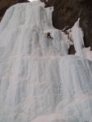 Me on the last pitches of Polar Circus (V, WI 5), Icefields Parkway. Photo by Hedd-wyn Williams