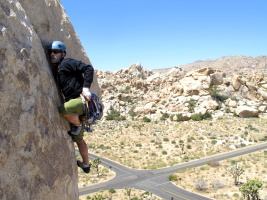 Karen on the North Overhang, Intersection Rock in Joshua Tree. After pulling a roof, the exposure at this spot is incredible!