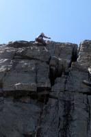Me leading the 5.10b to free our other rope.. :)