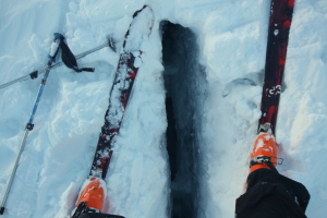 With the fresh snow, the small crevasses were hard to see. One of my skis went into this one, thigh deep.. scary