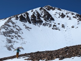 Traversing to Green Creek Couloir with our tracks in the background