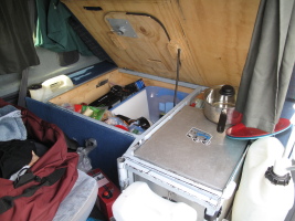 The 'kitchen' in our van. The fridge was totally awesome to have!