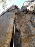 There were only 4 of us and 400 routes to choose from, but we managed to be right beside each other on the first one :) Beautiful crack to warm up...