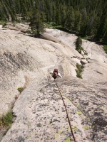 Melissa about to go up a small roof on the route