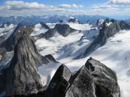 Snowpatch and Pigeon from the south summit of Bugaboo Spire.