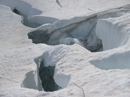 crossing one of the big crevasses on the way back - check out the weak snow bridge!