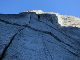 Rappelling down the last rappel to the packs!
