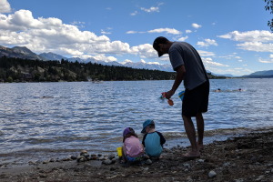 Playing on Lake Windermere beach