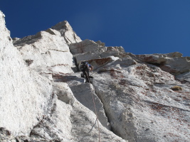 The route follows the obvious wide crack for the first pitch