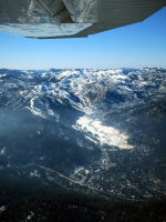 Squaw Valley with highway 89 below. Some smoke from a prescribed burn...