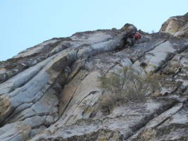 The upper crack is marked as 5.10b, pretty dirty