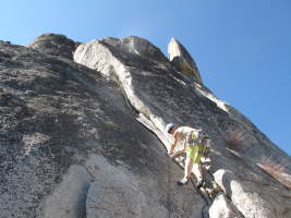 Starting up a 5.5 lieback on Middle Spire, on the sharp end