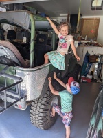 The kids finally climb into the Hulk on their own