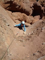 Melissa on the crux (5.10+ in reality)