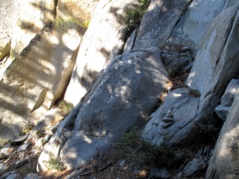 Cairn at the base of the vegetated gully