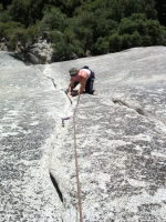 Coming up the first pitch of Serenity Crack, happy in the sun!