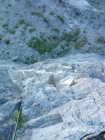 Looking down at the first two pitches - the 5.11a crux is just below me