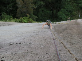 Melissa cruises the 5.10d next to Apnea