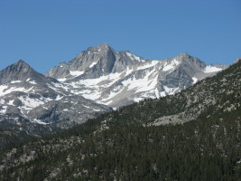 Nice view of Bear Creek Spire on the approach - the sun/shade line is the North Ridge (5.8)