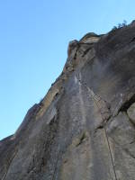 Starting up the 5.9 crack on the left, linking into the next pitch (you can barely see me).