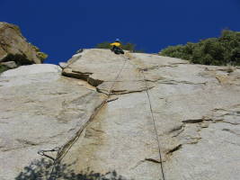 Karen leading a 5.10a face