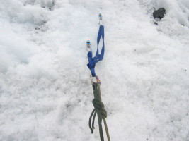 anchor with 2 ice screws, victim rope tied with prussic (left) and rescue rope (right)