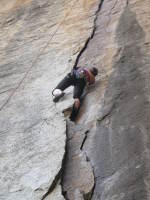 Melissa past the crux, below the real hand crack