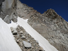 The descent to the base goes down these rocks