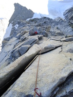 Looking down from the summit onto the best 5.9 in the universe - note the shadow of the pillar!