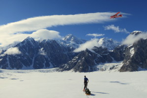 A plane of tourists flying through, with Denali in the background - wow!
