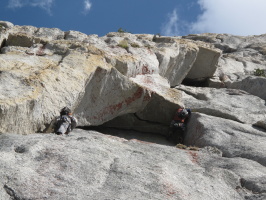A party on Serrated Edge (leader at the awkward 5.10b crux move)