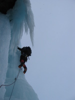 me stepping out onto the crux pillar