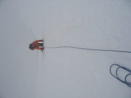 John climbing steep snow after having crossed the bergshrund