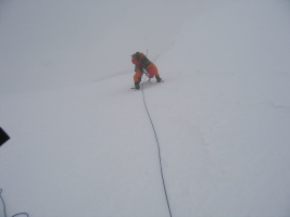 John climbing steep snow after having crossed the bergshrund