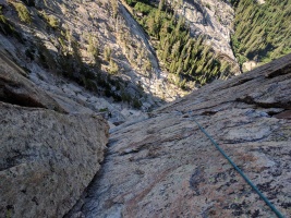 Looking down at the third pitch - great featured rock
